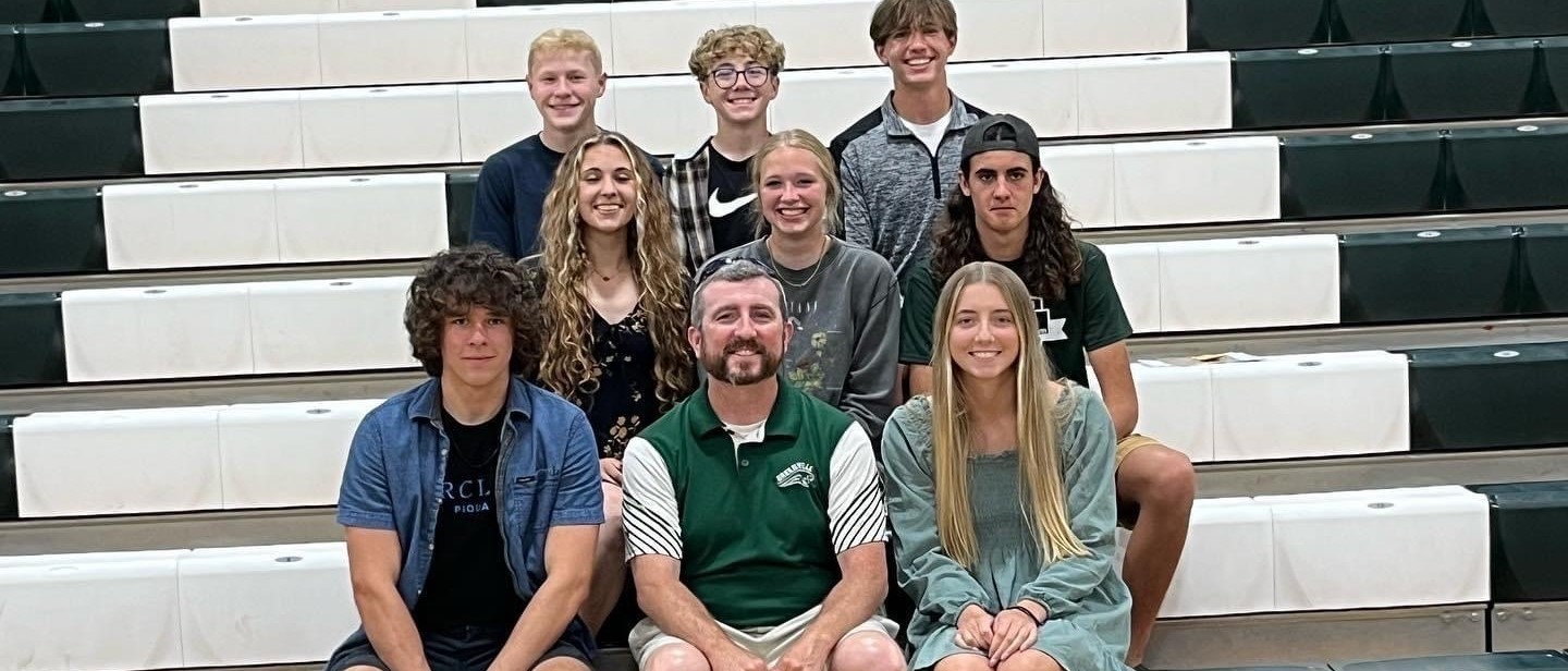 Track Athletes and Coach